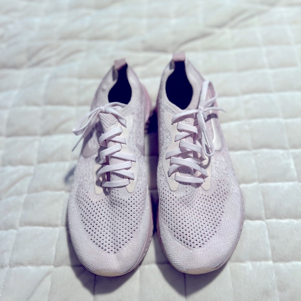 Light pink Nike Tennis shoes